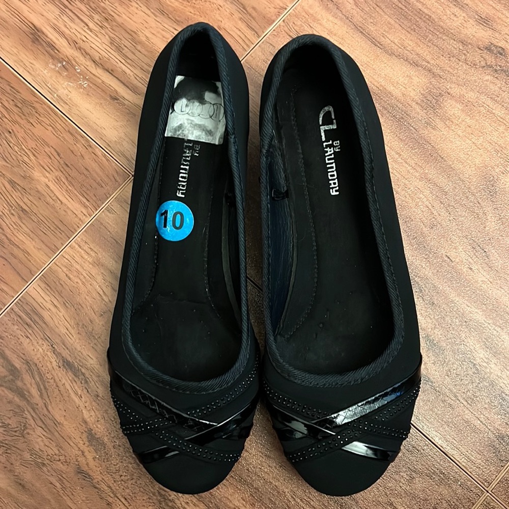 Black ballet “flats”